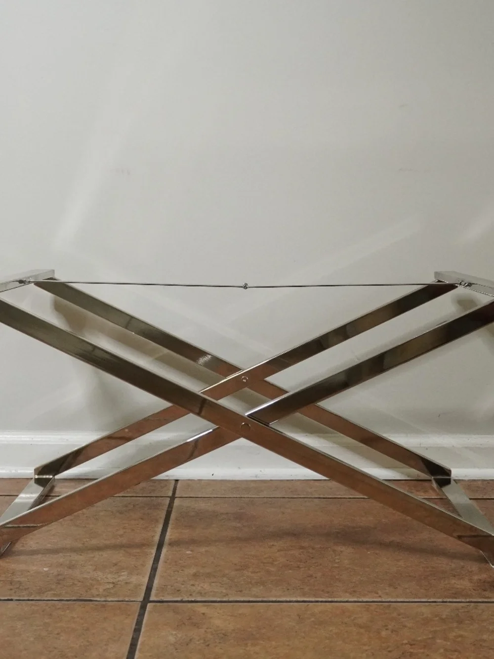 West Elm chrome tray table stand features a polished metal finish